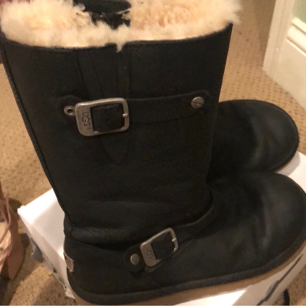 Nice used Uggs boots with silver buckle